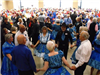 People country dancing wearing blue