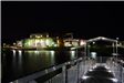 outside of conference center, pond, and dock at night