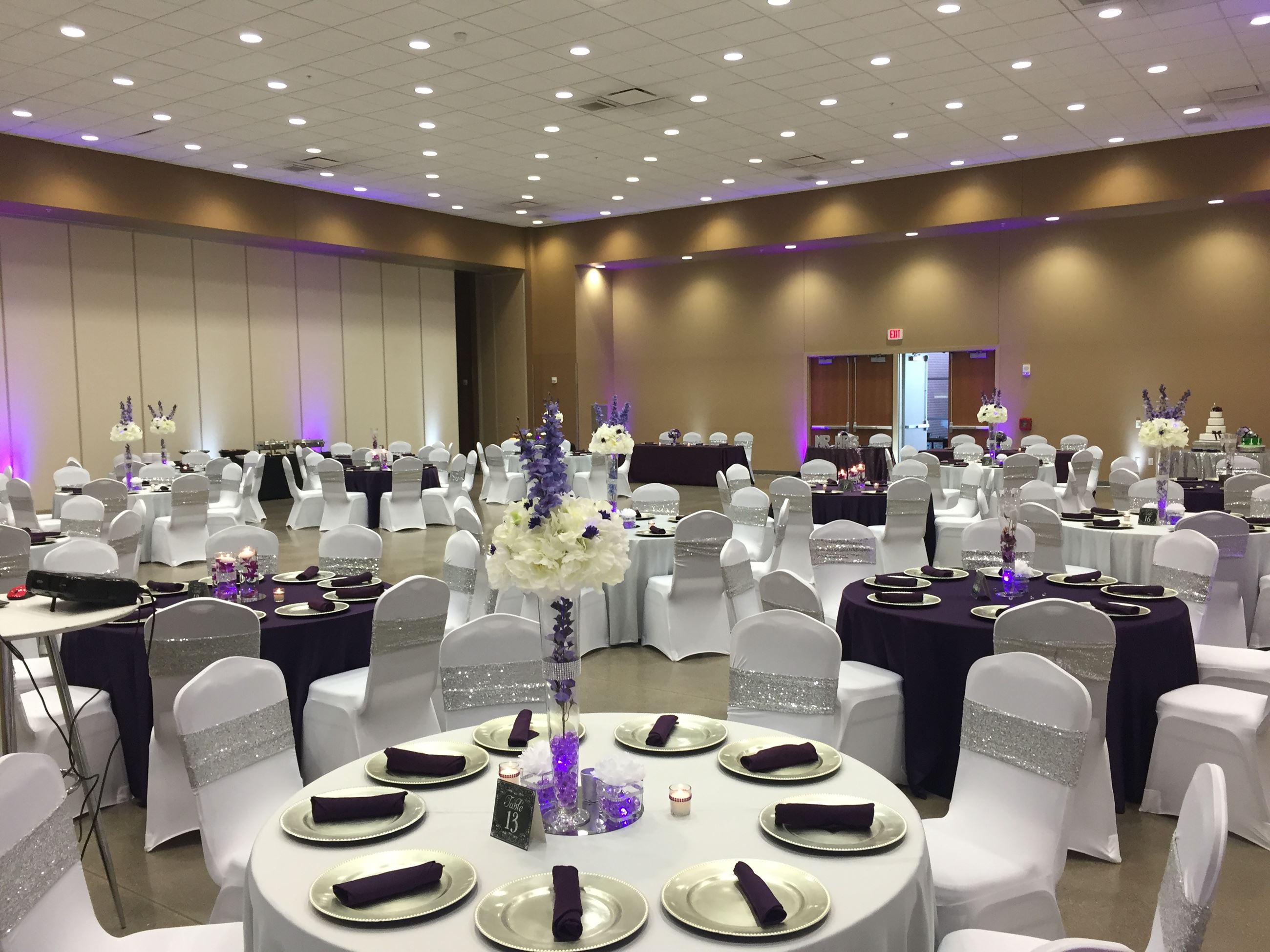 Purple and white wedding reception